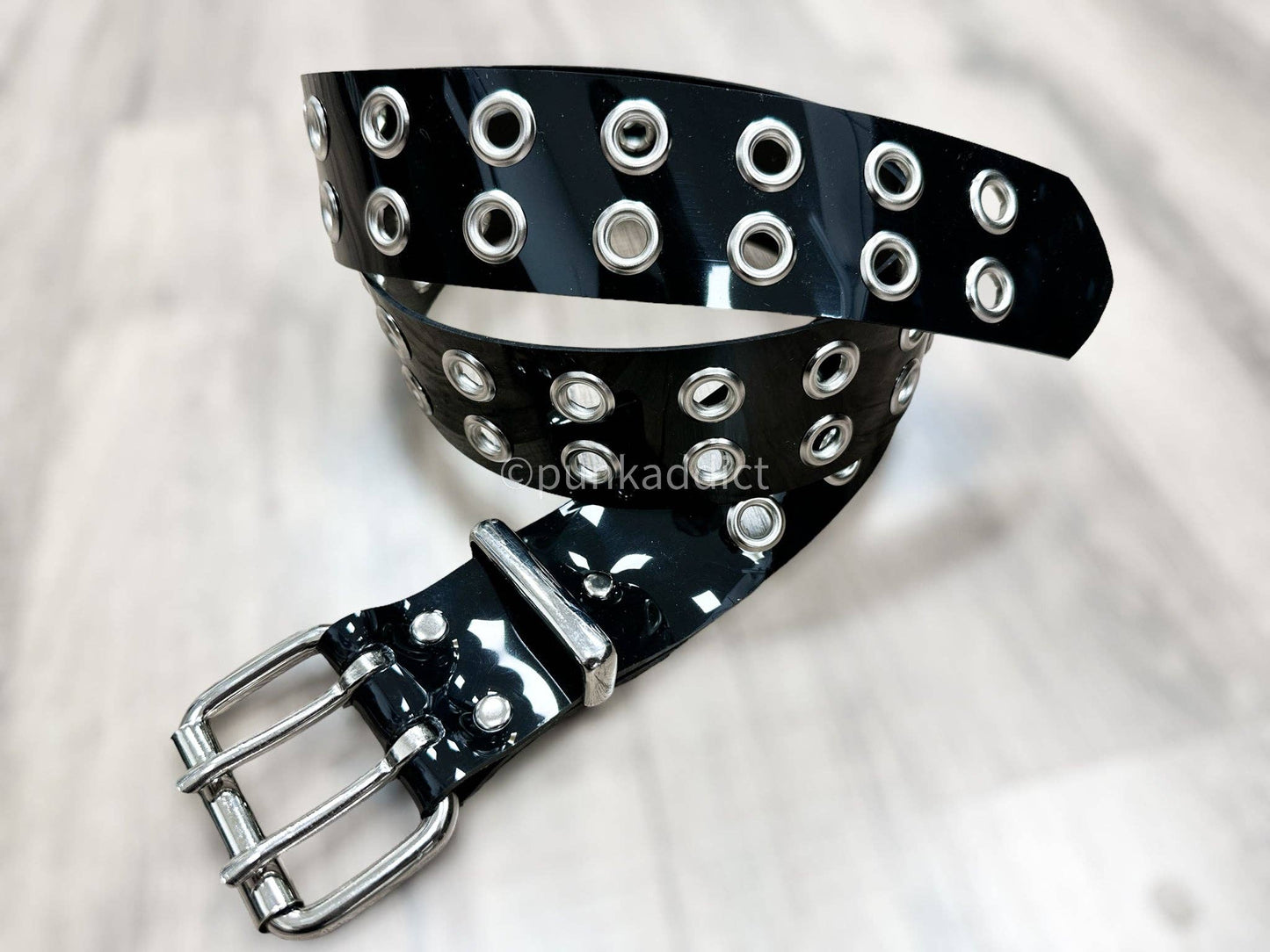 Blk Pvc Vnyl Black Grommet Belt