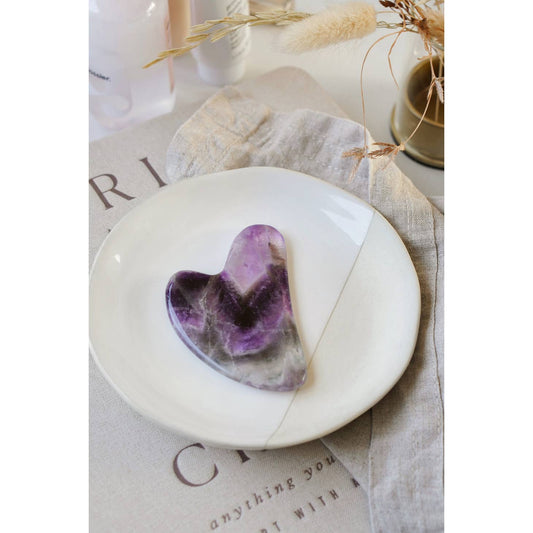 Shadowed Serenity: Amethyst Crystal Gua Sha with Black Skull Pouch