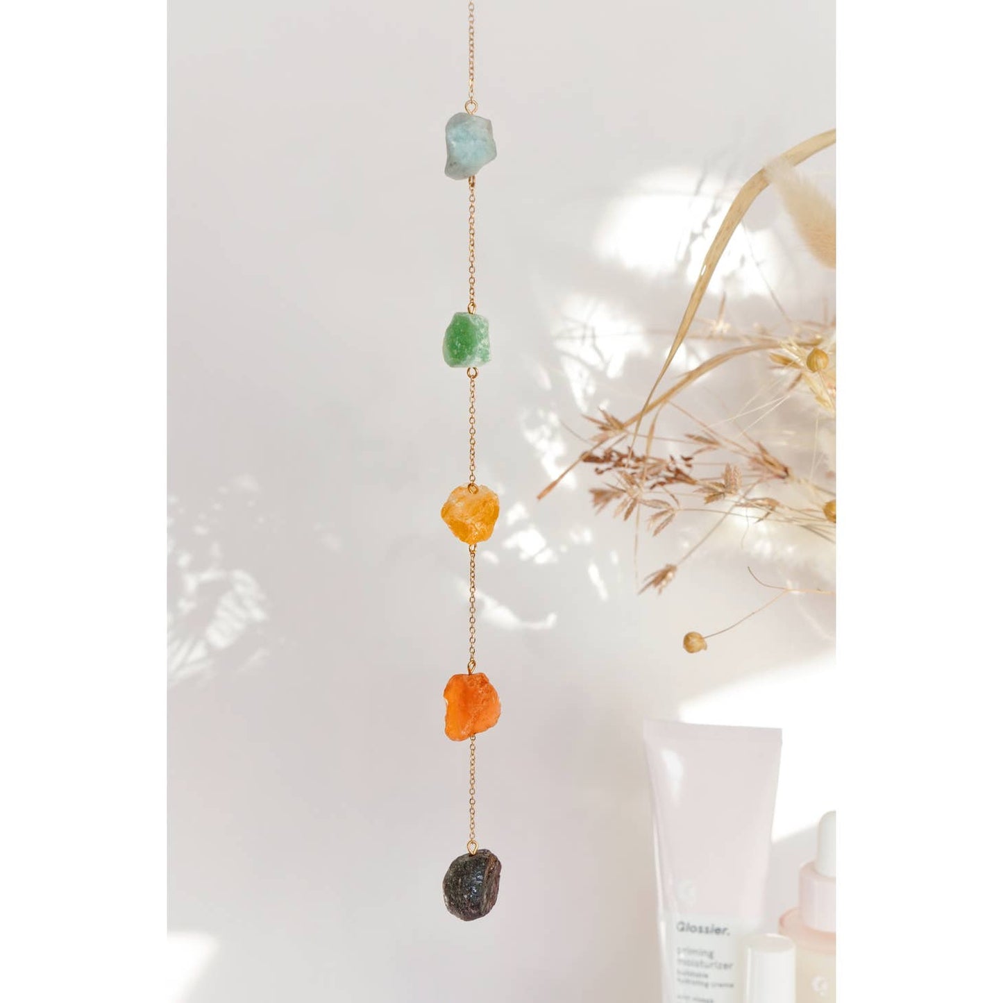 Chakra Harmony: 7 Raw Crystal Window Hanging in Gold Tone